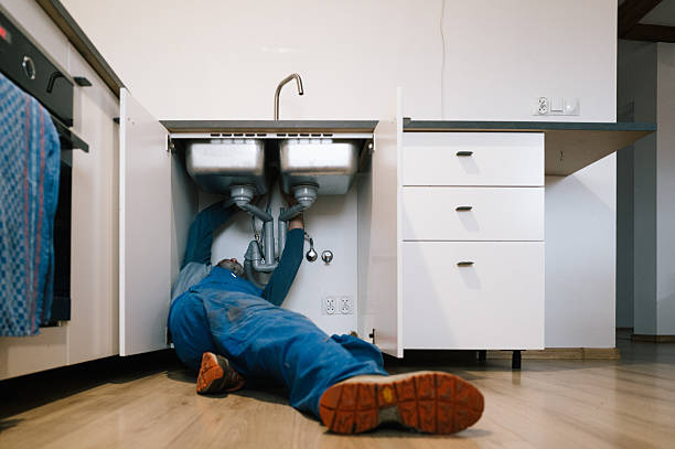 Professional Drain Cleaning technician working in Bear Creek, AK